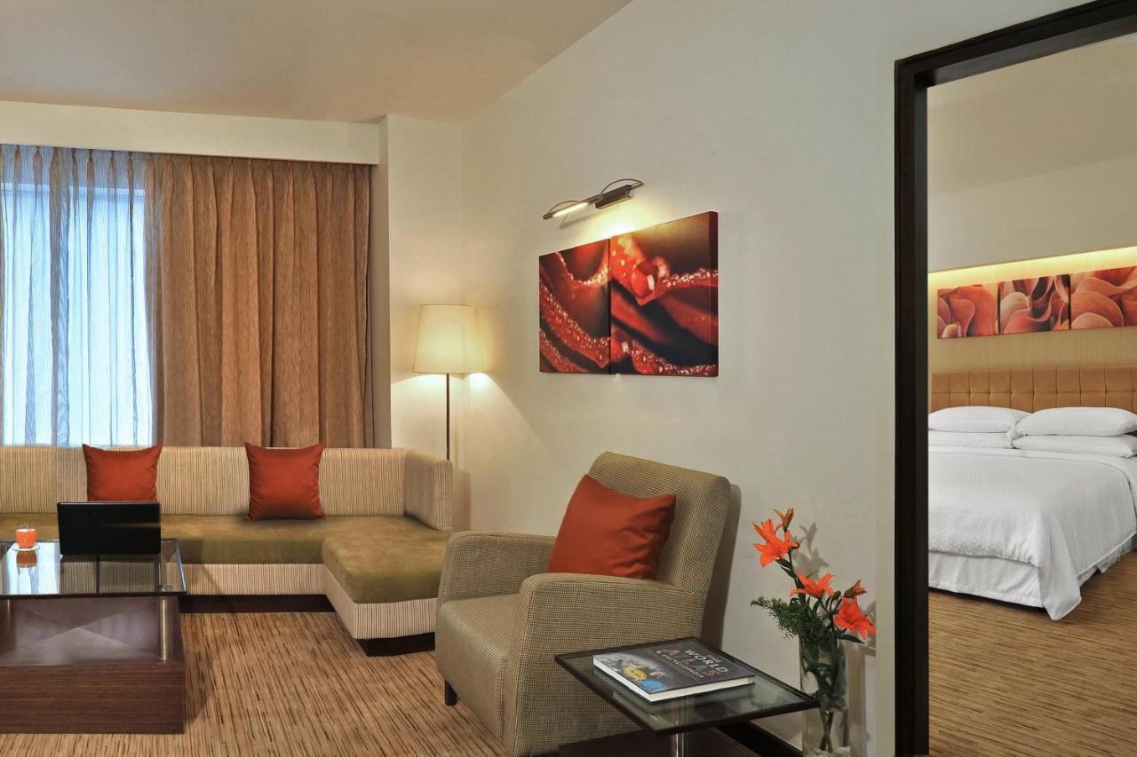 Four Points By Sheraton Hotel And Serviced Apartments Пуна Экстерьер фото