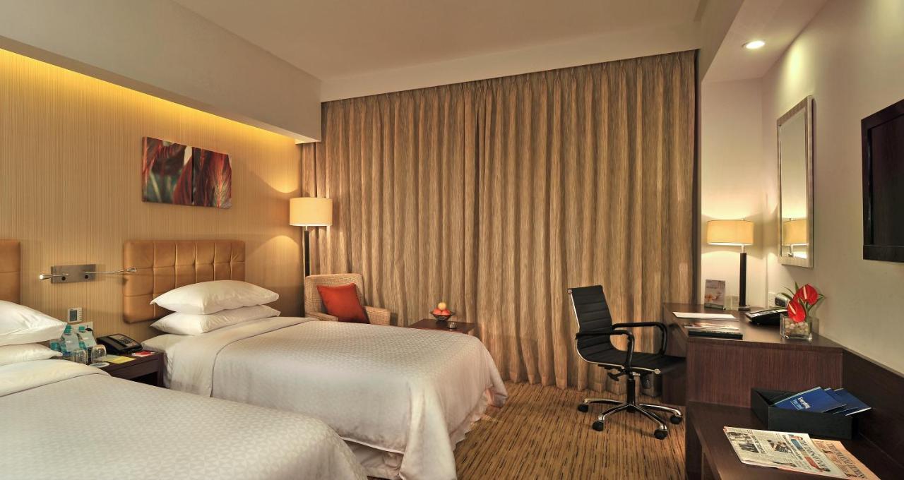 Four Points By Sheraton Hotel And Serviced Apartments Пуна Экстерьер фото