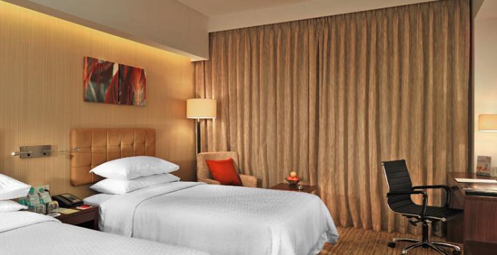 Four Points By Sheraton Hotel And Serviced Apartments Пуна Экстерьер фото