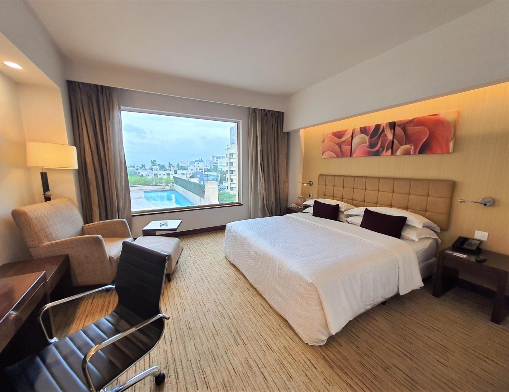 Four Points By Sheraton Hotel And Serviced Apartments Пуна Экстерьер фото